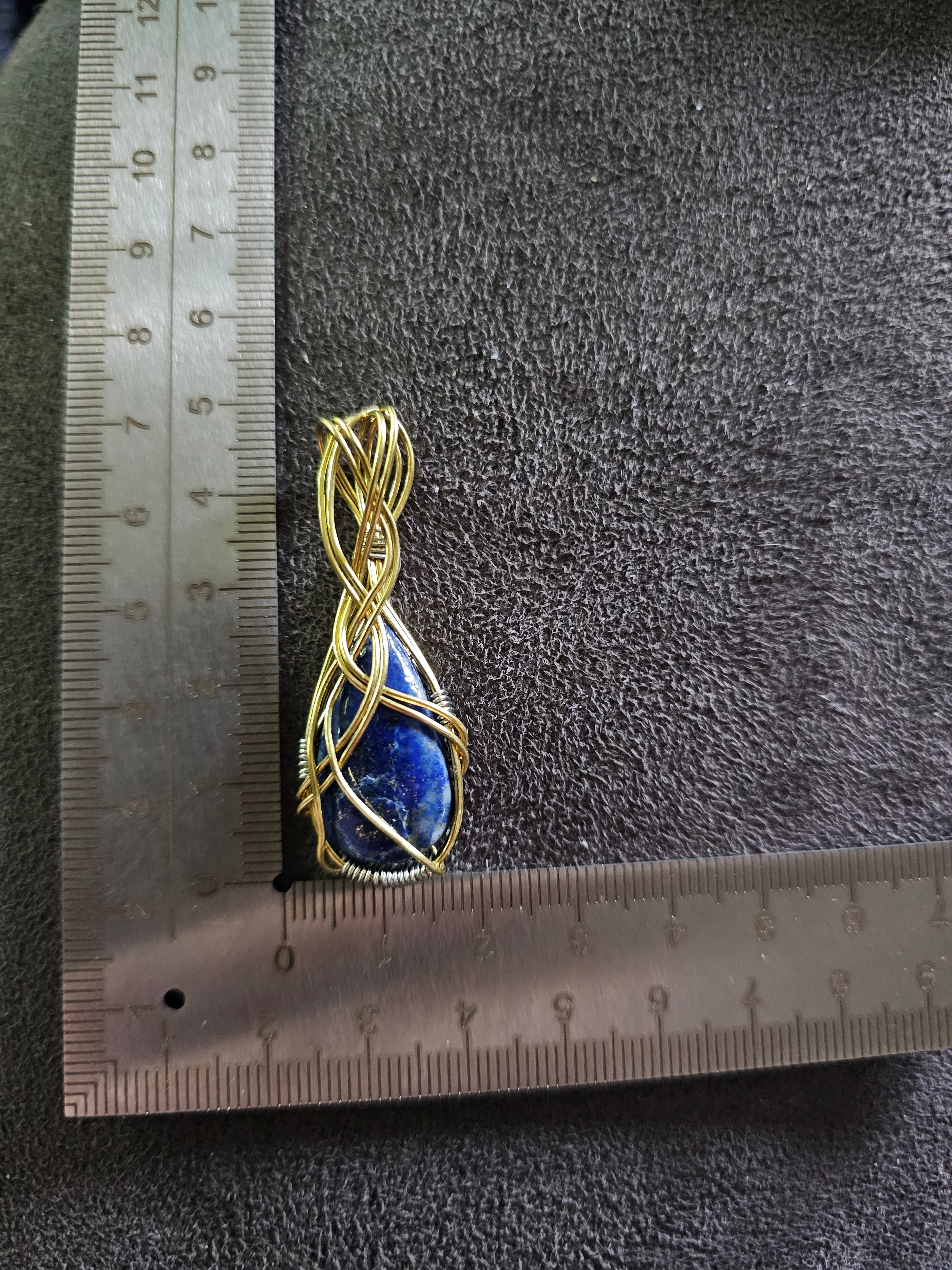 Lapis in gold pendant
